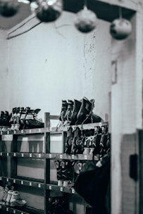 Close-up of skates and performance gear laid out neatly on a bench before training.