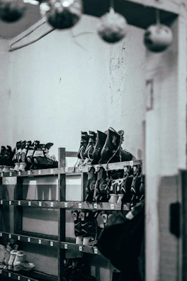 Close-up of skates and protective gear neatly arranged before class