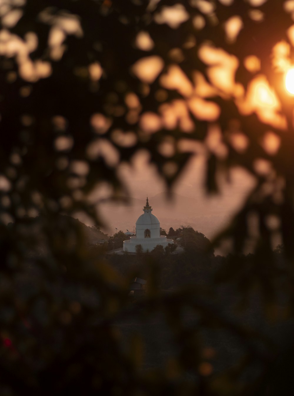 silhouette of building during sunset