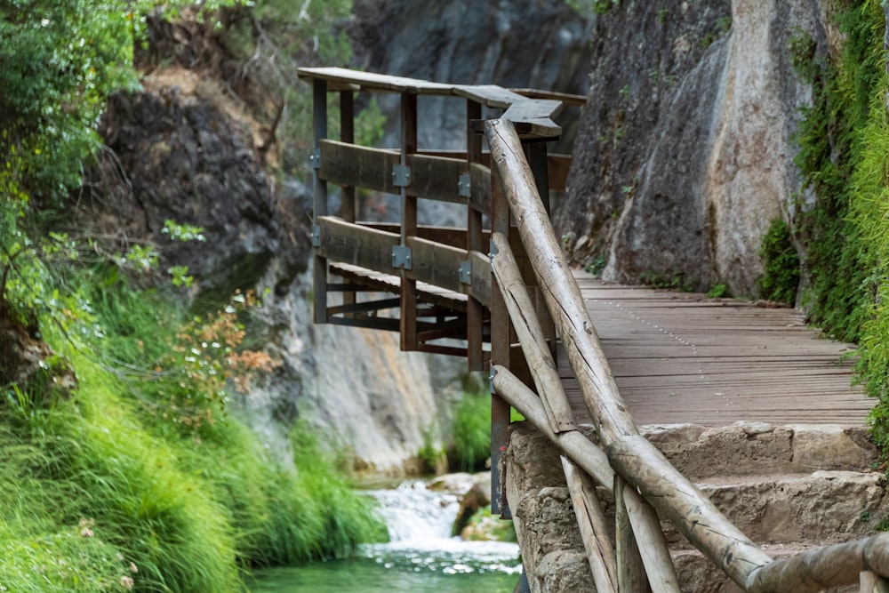 brown wooden stairs near river during daytime