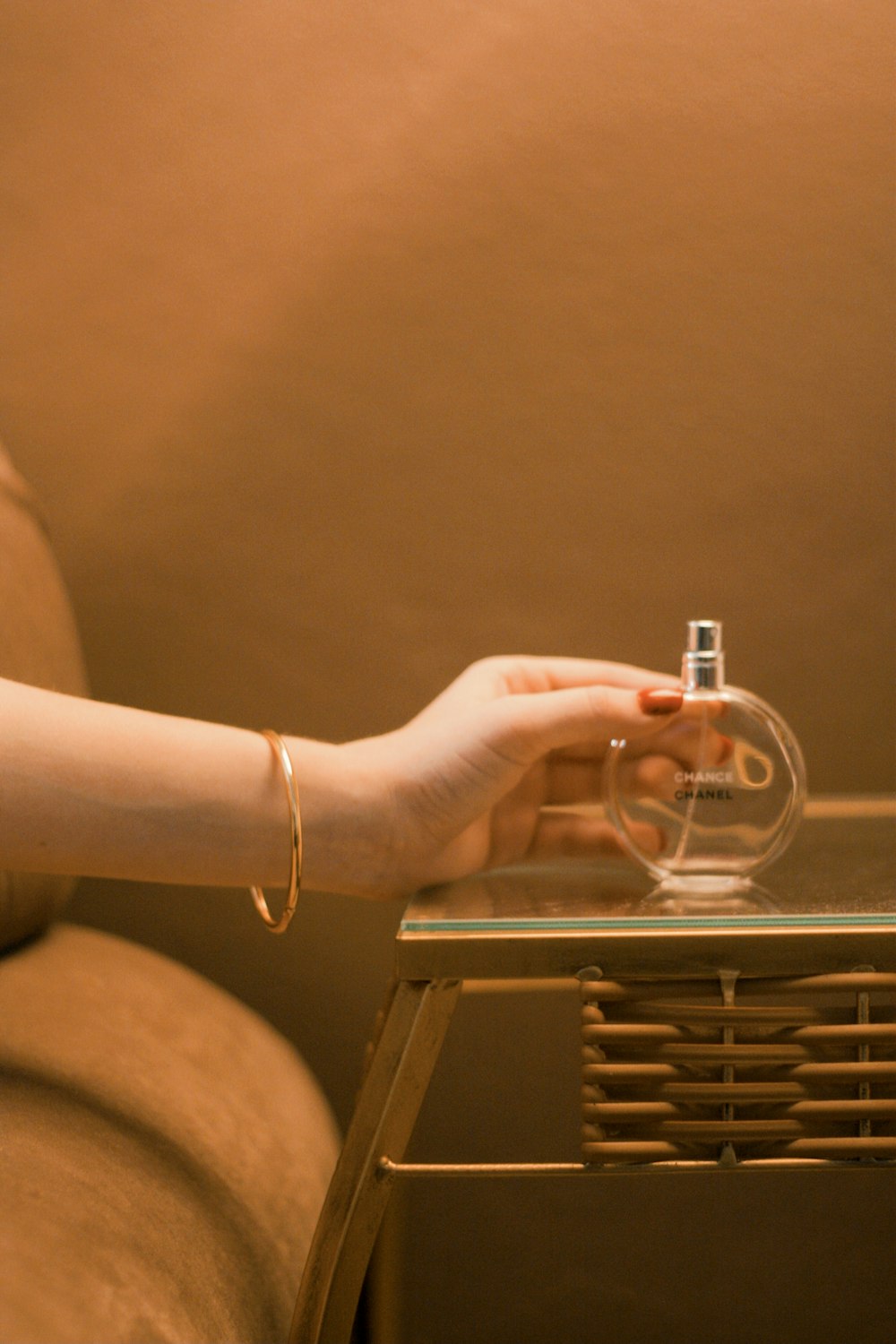 person holding clear glass cup