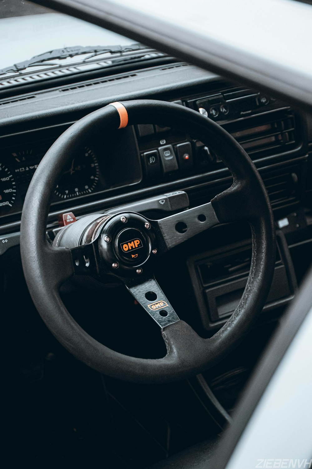 black and orange steering wheel