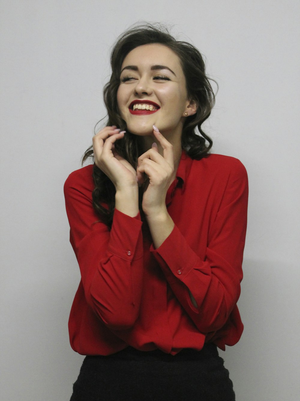 woman in red button up long sleeve shirt