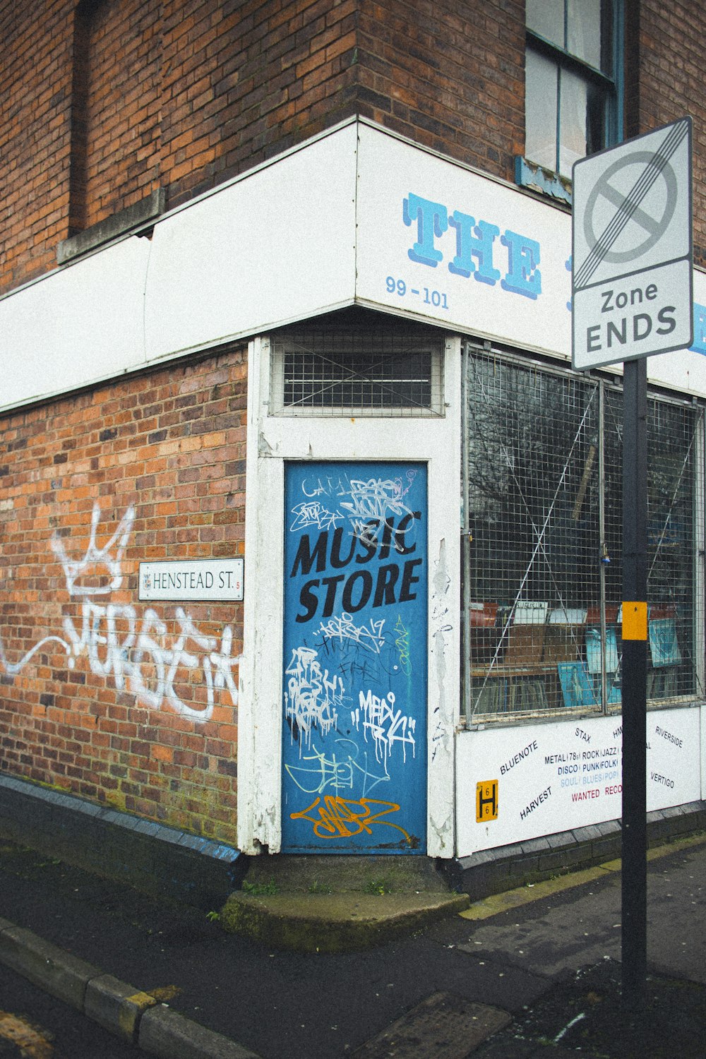 white and blue wall graffiti