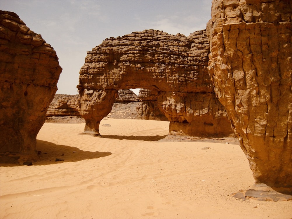 brown rock formation under blue sky during daytime