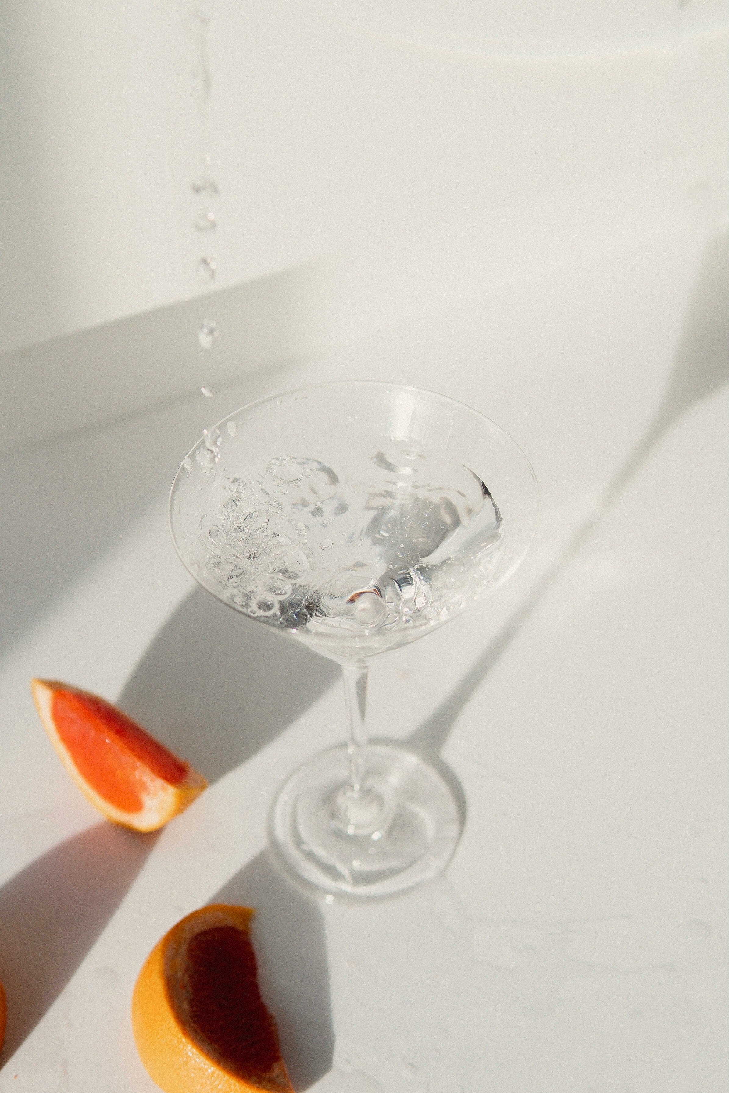 clear wine glass on white table