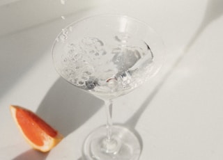 clear wine glass on white table