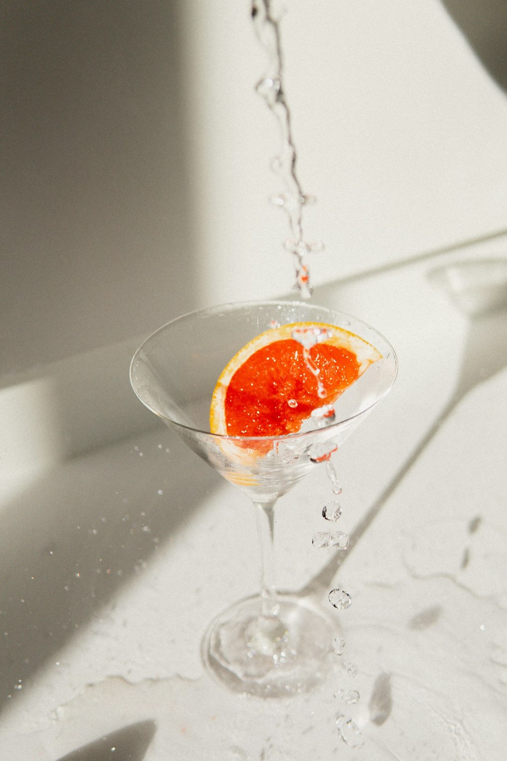 clear wine glass with orange liquid