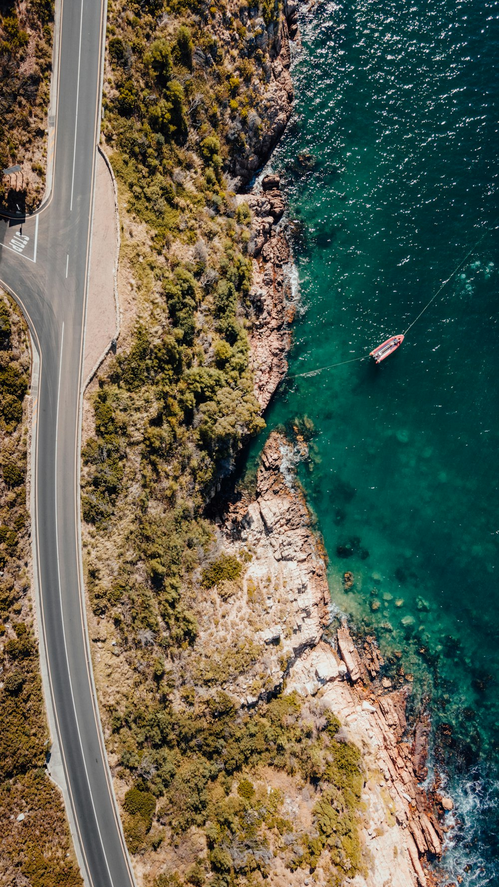 aerial view of a boat on a body of water