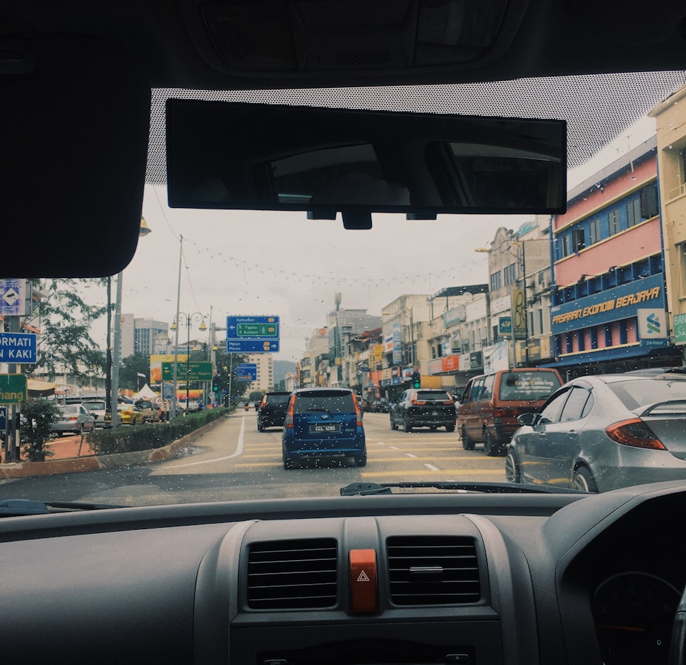 cars parked on side of the road during daytime