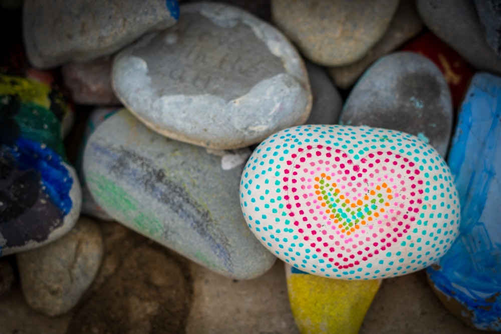 white and pink heart shaped stone