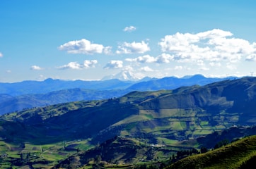 green mountains under blue sky during daytime