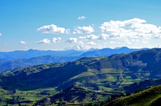 green mountains under blue sky during daytime