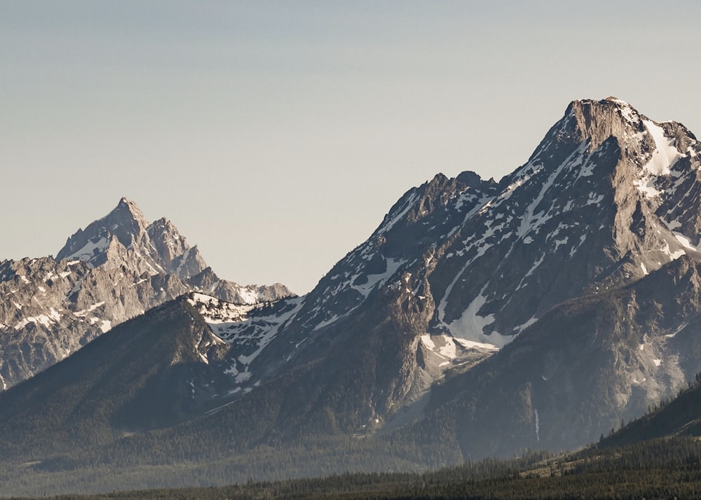 snow covered mountain during daytime