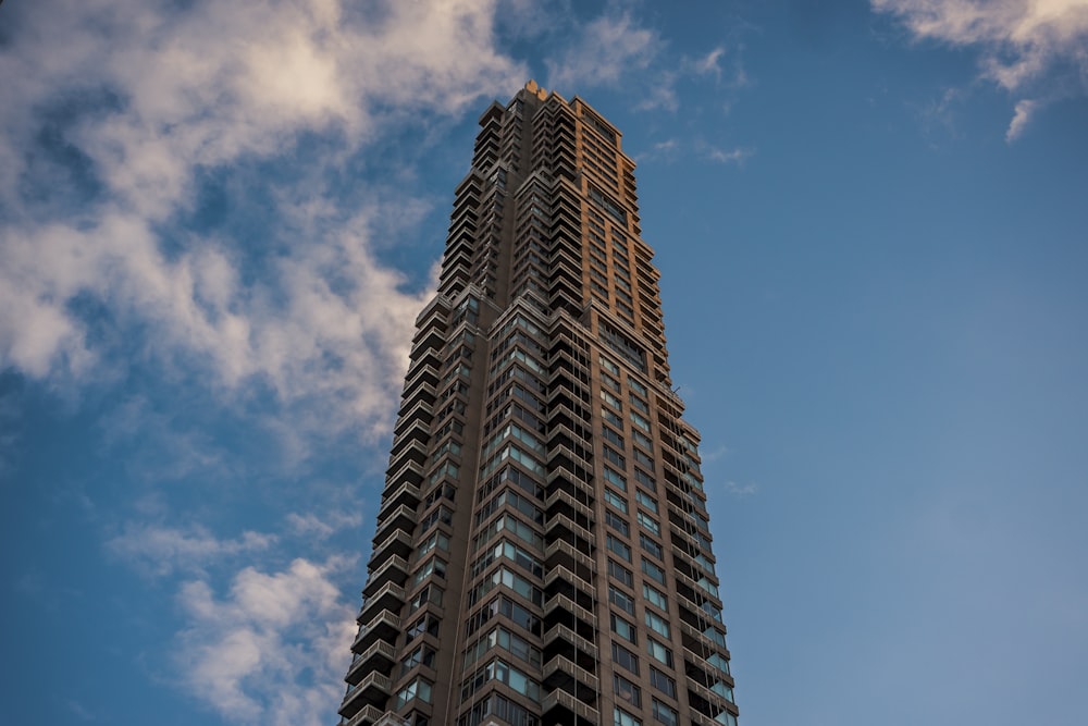 brown concrete building under blue sky during daytime