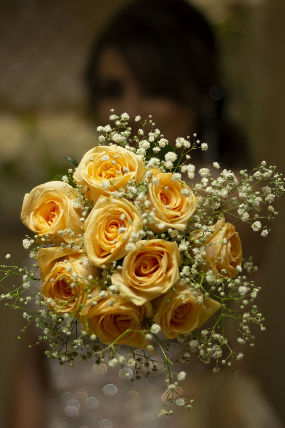 yellow roses in tilt shift lens