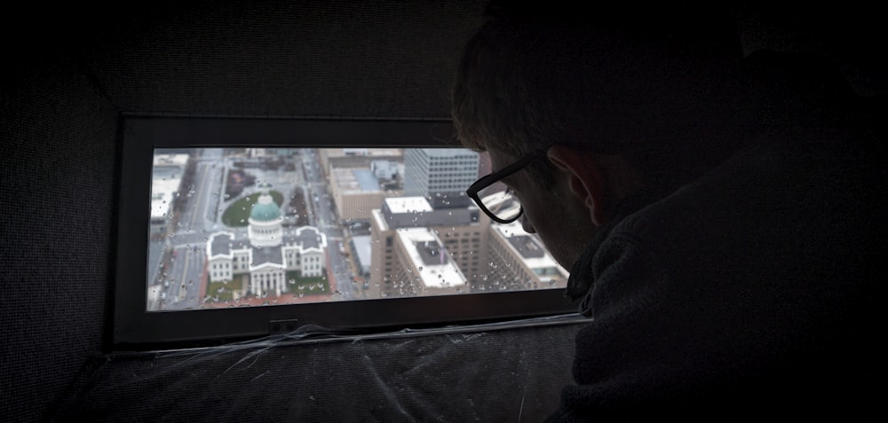 man in black framed eyeglasses