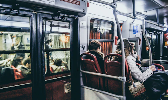 Passengers boarding a clean, comfortable bus at a busy northern Mexico terminal.