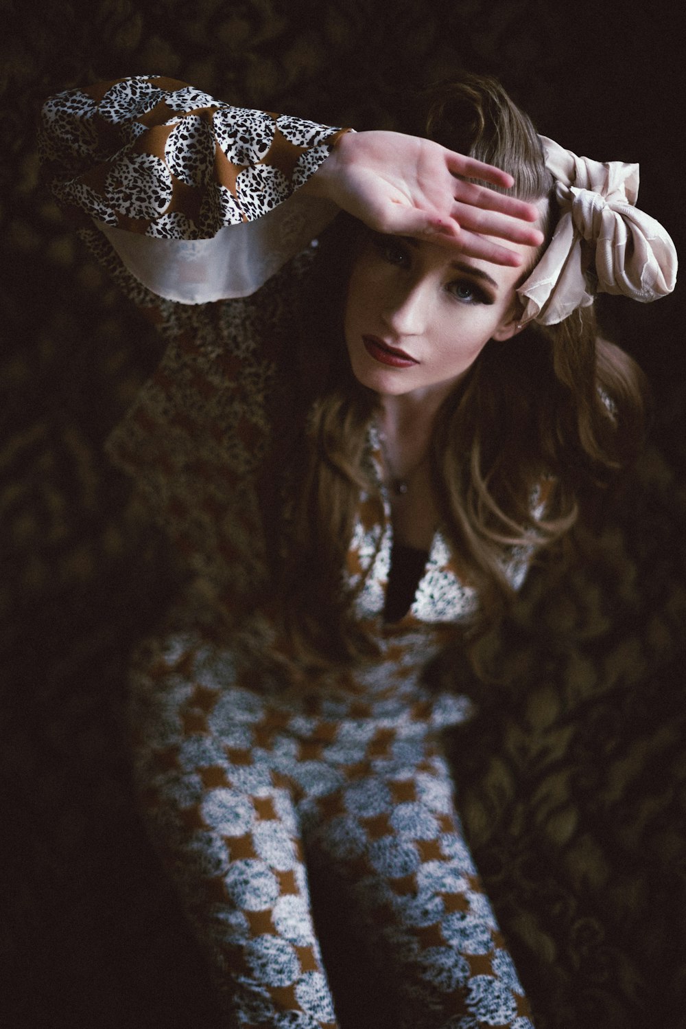 woman in white and black polka dot shirt