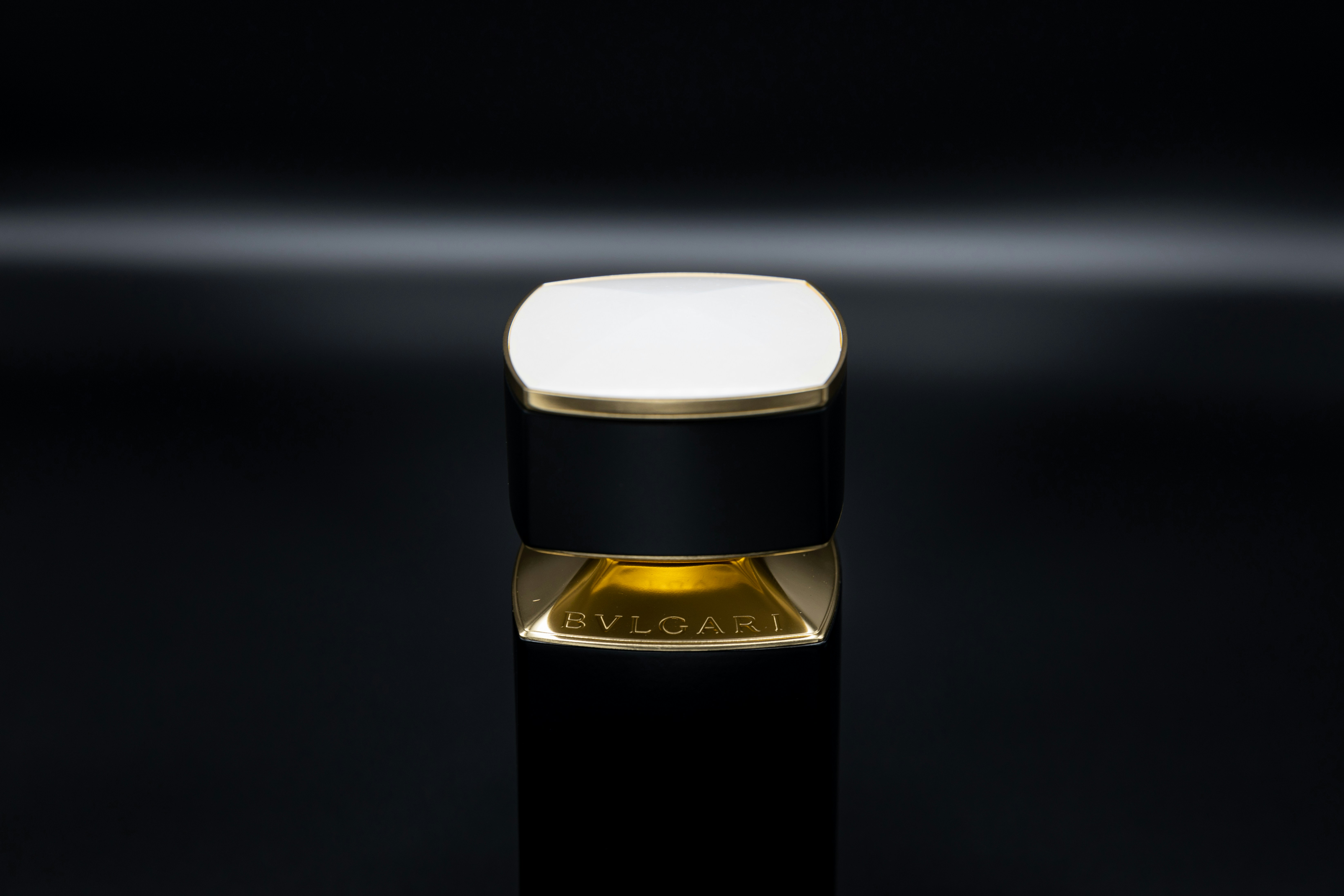 Black and white glass bottle