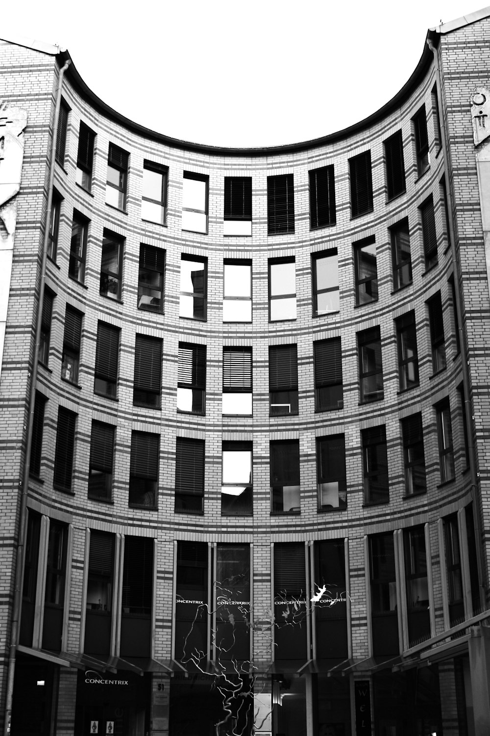 grayscale photo of concrete building