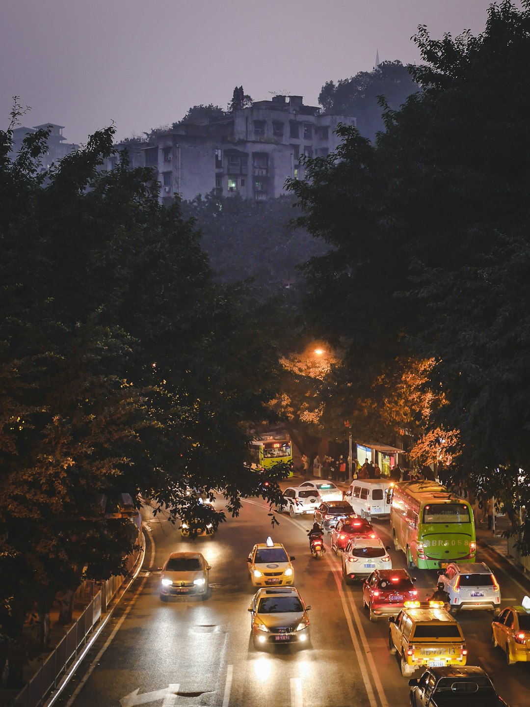 cars parked on parking lot during night time