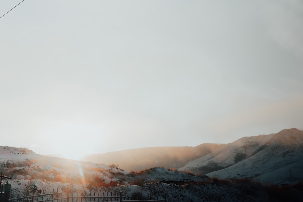 brown mountains under white sky during daytime