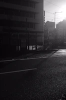 A serene street scene in soft beige tones, capturing quiet moments in the city.