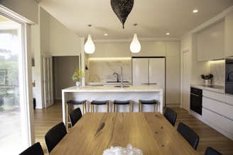 brown wooden table with chairs