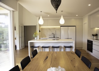 brown wooden table with chairs