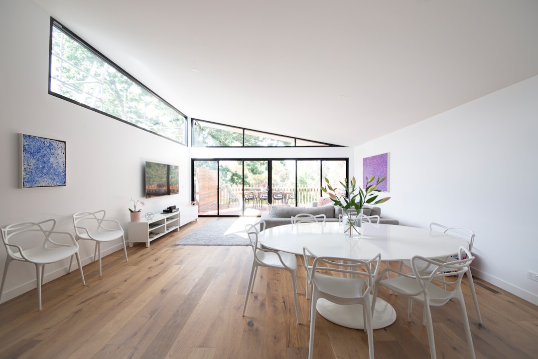 white and brown wooden table and chairs