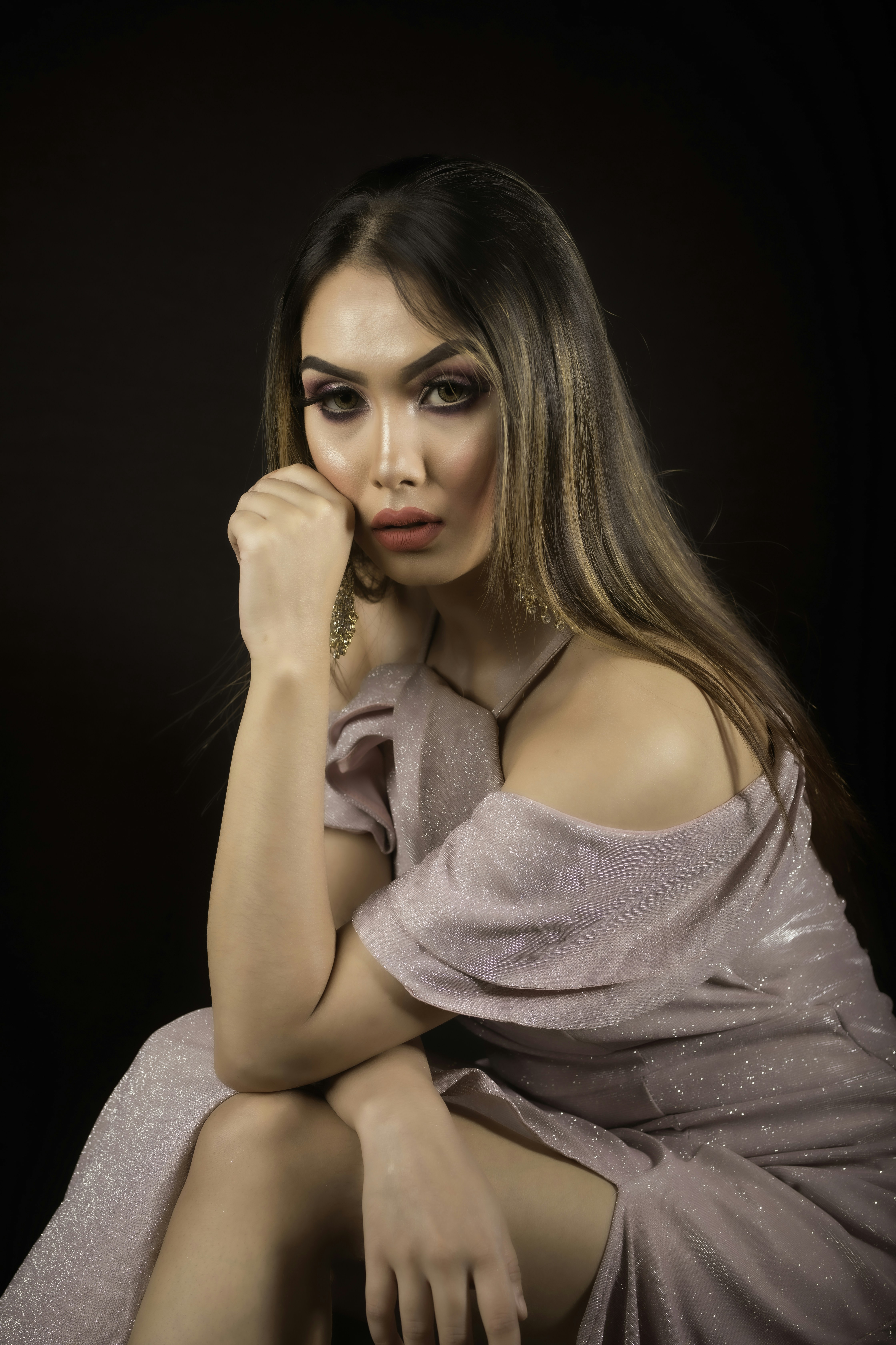 woman in white spaghetti strap dress