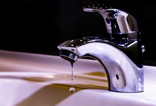 New tap installed on a ceramic sink