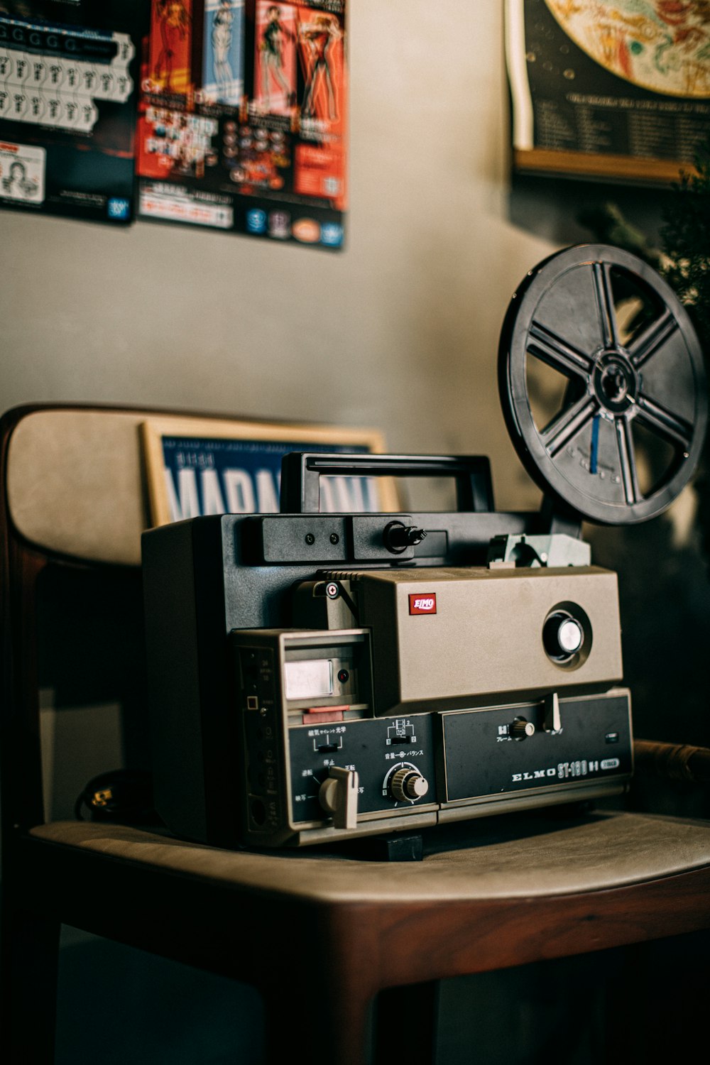 black and gray camera on brown wooden table