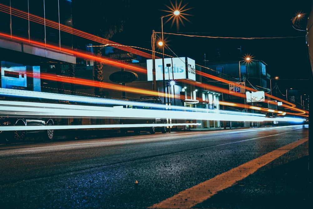 time lapse photography of city road during night time