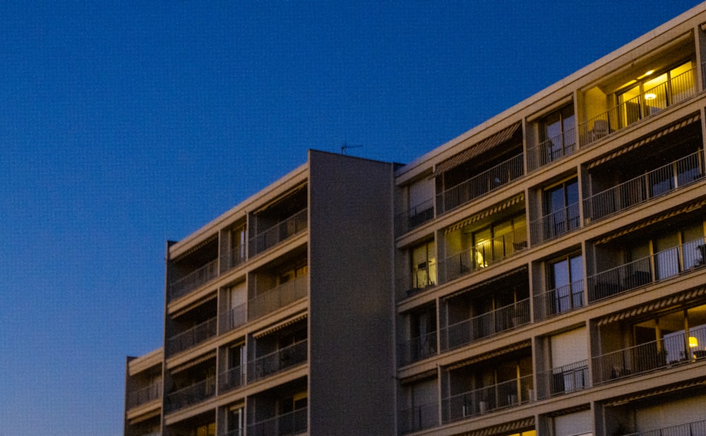 brown concrete building under blue sky during daytime