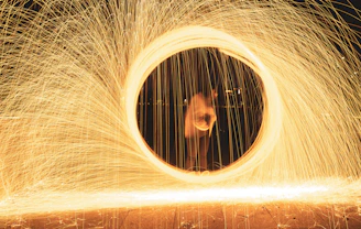 User celebrating a win with vibrant violet light trails swirling around