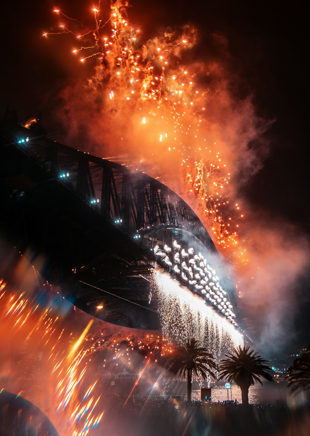 fireworks display over bridge during night time