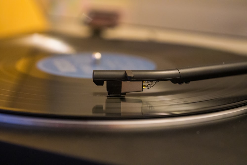 black and silver vinyl record player