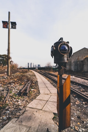 A close-up shot of an electronic interlocking control panel with LED indicators lit up, showing complex railway signaling.
