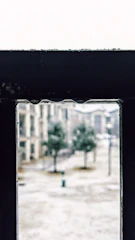 A moody black and white frame from a psychological thriller.