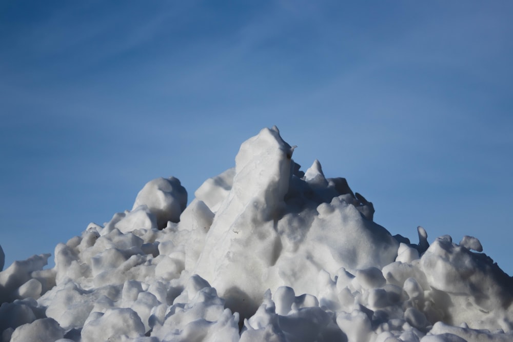 white ice formation under blue sky during daytime