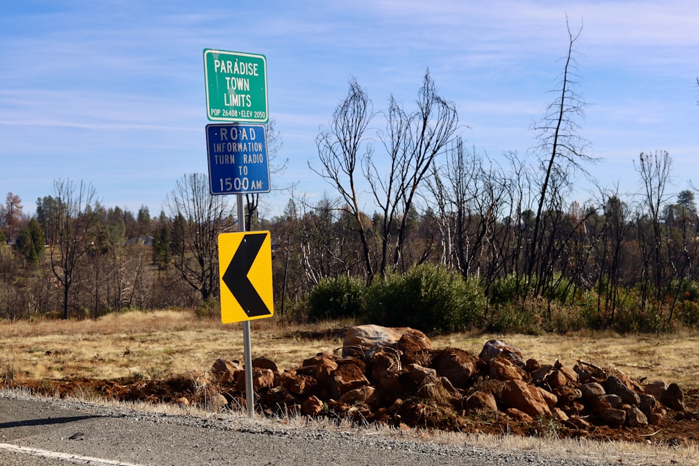 yellow and blue road sign