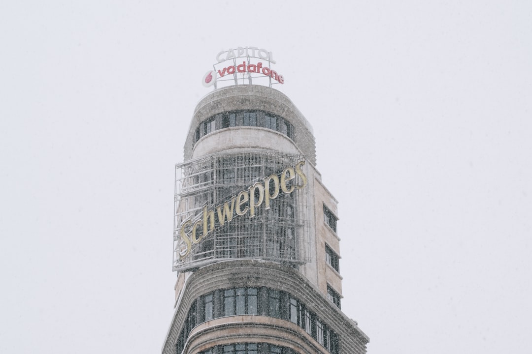 gray concrete building under white sky during daytime