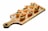 A wooden serving board holds six pastry cups filled with a creamy mixture, garnished with shrimp and mushrooms. The pastry cups have a light golden-brown crust, and the toppings are arranged attractively.
