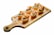 A wooden serving board holds six pastry cups filled with a creamy mixture, garnished with shrimp and mushrooms. The pastry cups have a light golden-brown crust, and the toppings are arranged attractively.