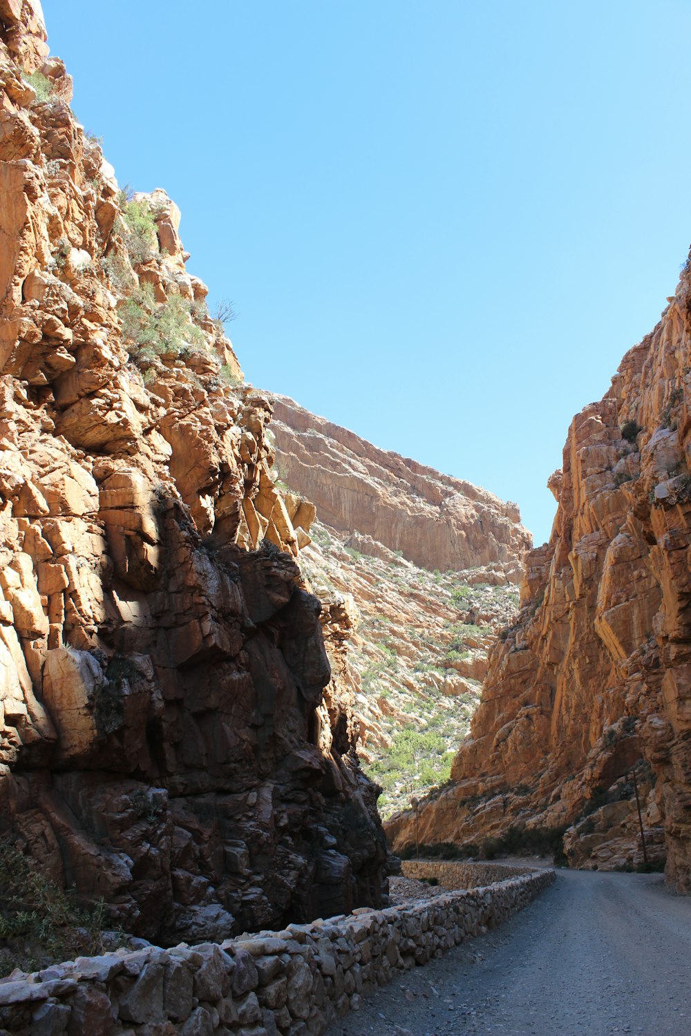 brown rocky mountain under blue sky during daytime