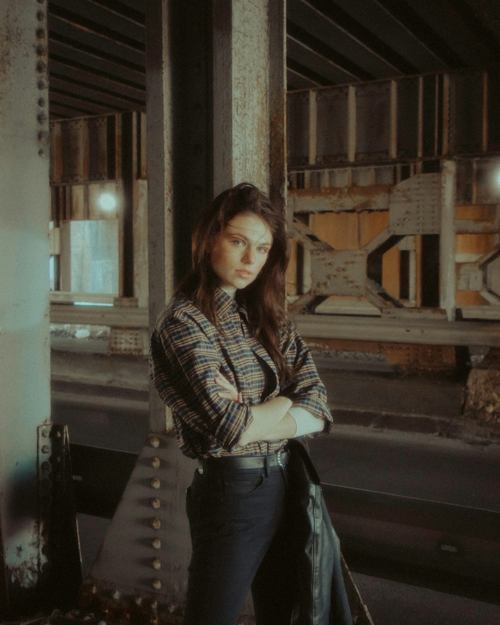 woman in black and white striped long sleeve shirt and blue denim jeans