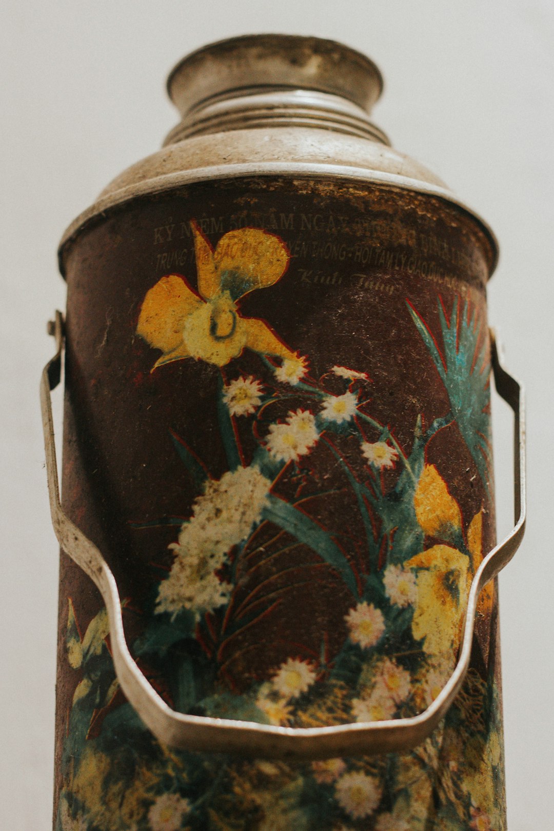 black and brown floral container
