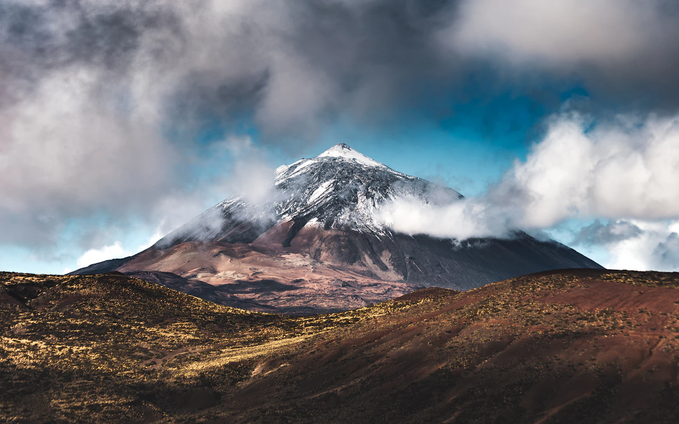 Mount Teide on Tenerife rising between the clouds
